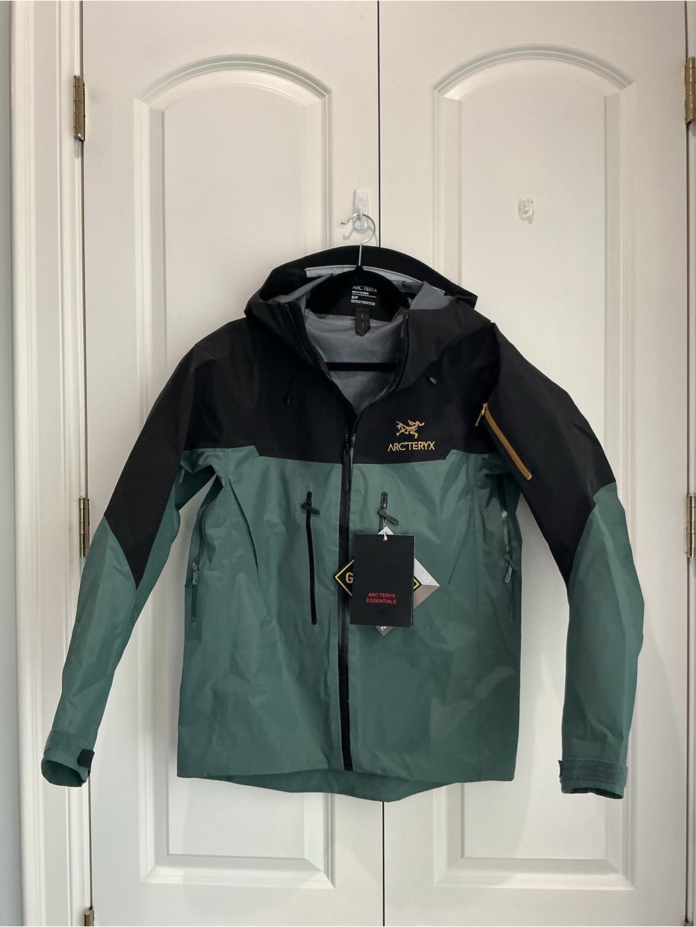 Arc'teryx Two-Tone Black and Teal Green Waterproof Shell Jacket